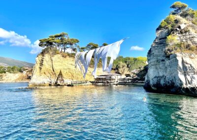 A stunning view from the small boat that will take us on the journey of Cameo island with its hanging white garments.