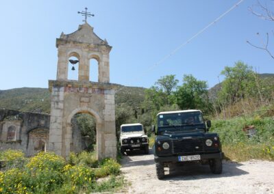 Jeep Safari in Zakynthos's mountains we pass through Small traditional Villages and this is a monasterrys building with a crucibell.