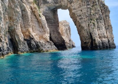 Amazing, coves in stone structures inside the sea they have made a small passage that looks like a door to the wonders of Zakinthos island