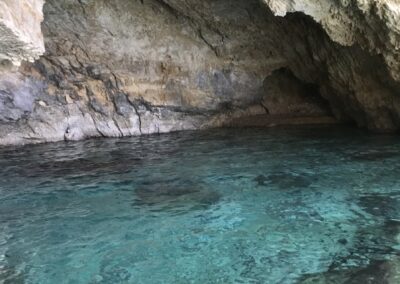 Turquoise water framed by the white rock in Keri caves, Zante island.