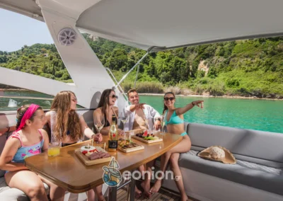 A group of friends enjoying a cruise on the north side of Zakynthos with Princess V55 Yacht