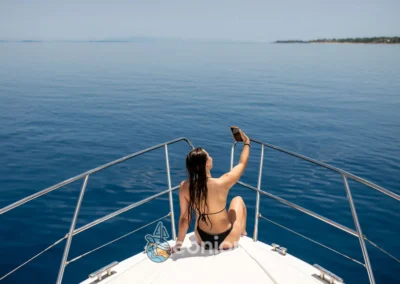 A woman taking a selfie on Princess V55 Yacht in Zakynthos Island